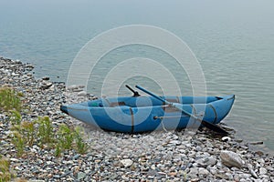 Inflatable rubber boat on the shore