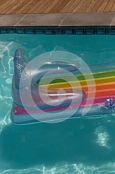 Inflatable tube floating in a swimming pool