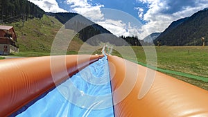 Inflatable water slide in adrenaline park