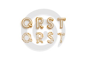 Inflated, deflated gold Q R S T letters, balloon font photo