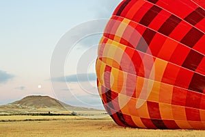 Inflating Hot Air Balloon in Vivid Color.