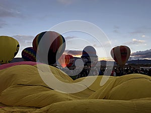 View of stages of inflation at the Albuquerque International Balloon Fiesta with a beautiful Sunrise. photo