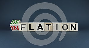 Inflation or Deflation The cubes form the choice words Inflation or Deflation