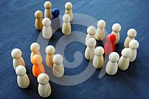 Influencer marketing. Groups of wooden figures photo