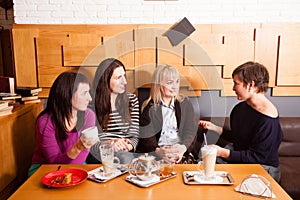 Informal meeting friends in cafe