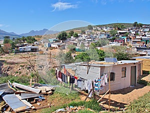 Informal settlement in South Africa with solar panels.