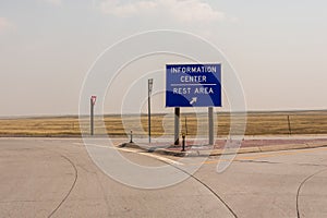 Information Center, Rest Area sign on the road intersection