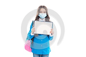 Information about coronavirus and quarantine. Child in mask hold open book. COVID-19 information