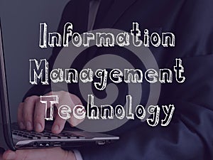 Information Management Technology IMT inscription on the piece of paper photo