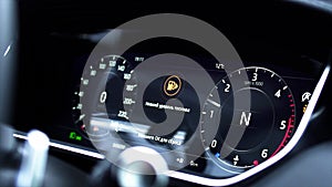 Information panel on a car - close up empty petrol, gasoline gauge dash board in car with digital warning sign of run