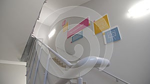 Information and pictures for children on staircase in school