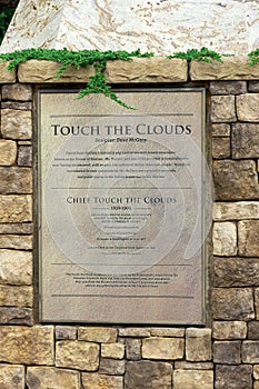 Information plaque on Chief Touch the Clouds sculpture, Edmond.