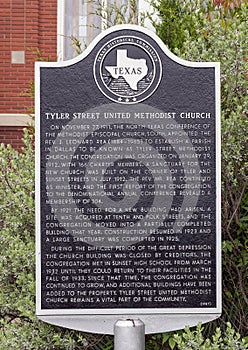 Information plaque for the empty historic Tyler Street United Methodist Church in Oak Cliff in Dallas, Texas.
