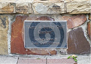 Information plaque for a fountain in an area in Oak Lawn Park by Arlington Hall in Dallas, Texas.