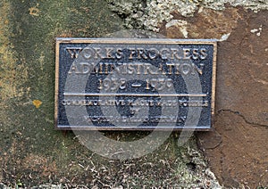 Information plaque Stone bench constructed by the New Deal Works Progress Administration in the 1930`s in Turtle Creek ParK