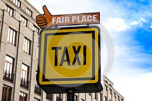 Information sign of a Taxi and Fair place on the background of houses in Prague