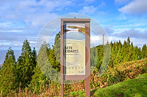 Information sign for tourists in Sete Cidades, Sao Miguel, Azores, Portugal. Wooden tourist sign in Portuguese Protected Landscape