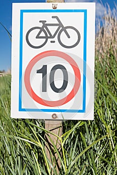 Information signboard about bicycle speed limitation photo