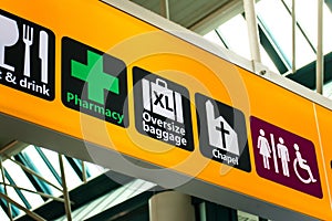Information symbols and icons in a signboard at the airport