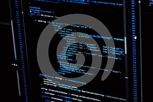 Information technology concept. Coding programmer language script text on screen monitor display. Programmer occupation job.