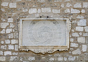 Informational plaque in Latin on the belltower of the Nice Cathedral, Nice, France