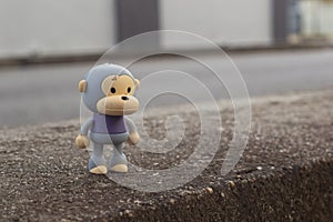 infrared image of the monkey toys on the asphalt street.