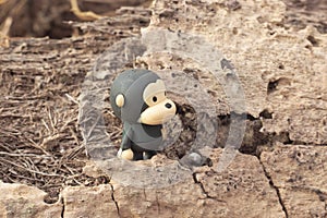 infrared image of the monkey toys on the dried deforested land