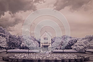 Infrared photo Museum building and pond lotus in Public park,