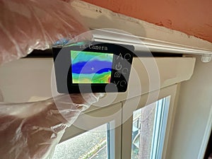 Infrared Thermal Imaging Camera Detecting Heat Loss in a Residential Setting