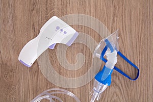 Infrared thermometer and nebulization tool for pneumonia