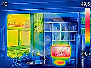 Infrared thermovision image showing heated TV and a window in th