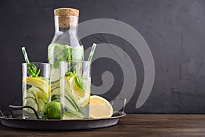 Infused water with cucumber, lemon, lime and basil