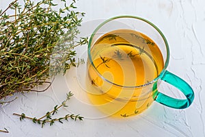 Infusion of thyme. Ingredient of Mediterranean cuisine and healing home remedy.