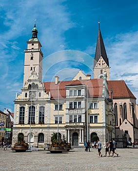 Ingolstadt, Bavaria - Germany - Tourists and locals walkig around at the old town square and the city hall