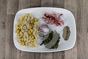 Ingradients for cappelletti, bacon and asparagus