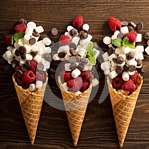 Ingrediens for smore`s dessert in a waffle cone