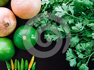 Ingredient of asia food with coriander , cilantro , onion , lime