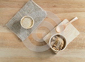 Ingredient grain, wheat germ and Brown sugar in wooden bowl