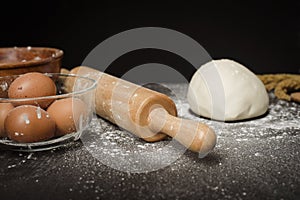 Ingredients bakery making on black wooden table