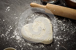 Ingredients bakery making on black wooden table