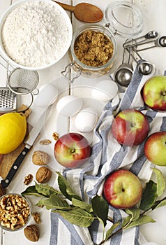 Ingredients for baking apple and nuts pie