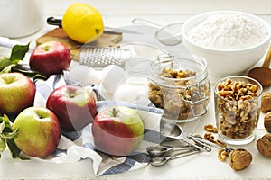 Ingredients for baking apple and nuts pie