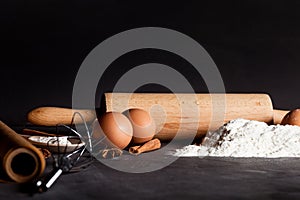 Ingredients for baking cookies on blackboard