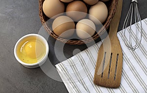 Ingredients for baking, kitchen utensils for cooking, fresh organic chicken eggs.