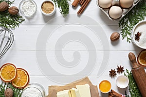 Ingredients for Christmas baking. Food preparation products: eggs, butter, flour, sugar. Food decoration for the new year