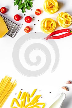 Ingredients for cooking paste white background top view mock up