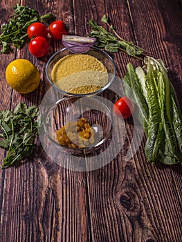 Ingredients for cooking Tabbouleh - Levantine vegetarian salad.