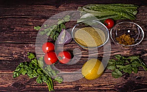 Ingredients for cooking Tabbouleh - Levantine vegetarian salad.