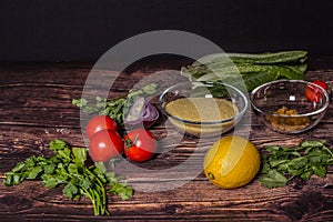 Ingredients for cooking Tabbouleh - Levantine vegetarian salad.