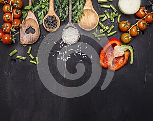 Ingredients for cooking vegetarian food wooden spoons, cherry tomatoes, dill, parsley, pepper border ,place text on wooden ru